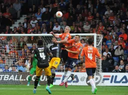 Steve McNulty and Luke Wilkinson combine to repel a Mansfield attack