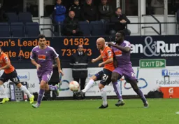 Luke Guttridge play the ball forward