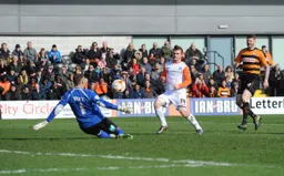 Jack Marriott`s shot beats Graham Stack but it is off target