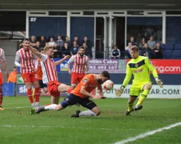 Josh McQuoid just fails to make contact with the ball