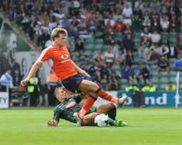 Cameron McGeehan rides the tackle