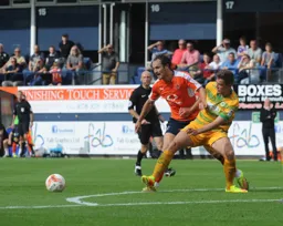 Danny Hylton gets blocked off