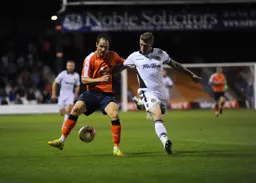 Danny Hylton shields the ball