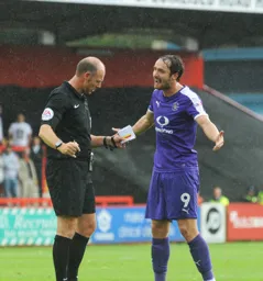 Danny Hylton tries to reason with the referee