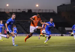 Isaac Vassell runs at the Gillingham defence