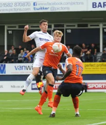 Cameron McGeehan chests the ball