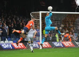 Dan Potts heads towards goal