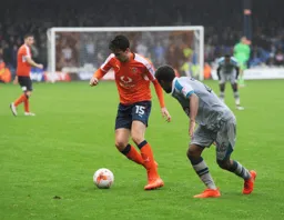 Alex Gilliead comes away with the ball