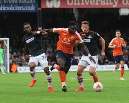Pelly-Ruddock Mpanzu gets past Cedric Evina and Jordan Houghton