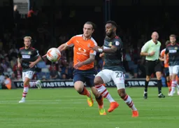 Jack Marriott focuses on the ball