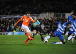 Alex Gilliead takes a shot at goal