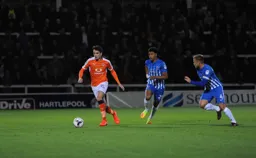 Alex Gilliead takes the ball away from the opposition