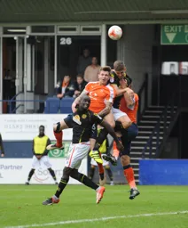 Glen Rea finds himelf sandwiched as he goes in search of a late winner