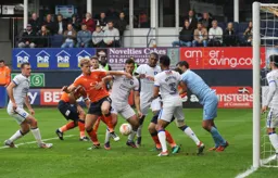 Confusion in the Mansfield goal mouth with Cameron McGeehan in the middle of it all