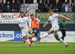 Jordan Cook takes a shot at goal