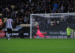 Christian Walton saves Aaron Collins early second half penalty