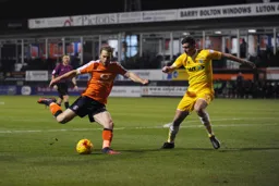 Craig Mackail-Smith lines up a shot at goal