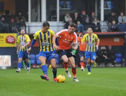 Jordan Cook battling for the ball