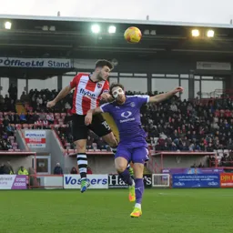 Danny Hylton wearing a face mask