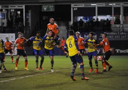 Scott Cuthbert rises highest to send a header towards goal