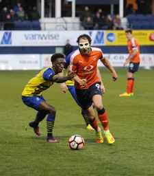 Danny Hylton beats his man