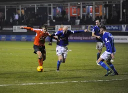 Cameron McGeehan holds a challenge from Jason Kennedy
