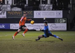 Jordan Cook`s shot beats Jamie Stephens but it is wide of the target