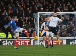 Stephen O`Donnell charges the ball down