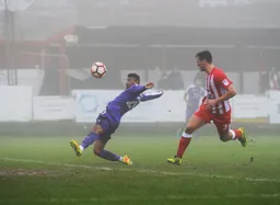 Isaac Vassell stretches for the ball