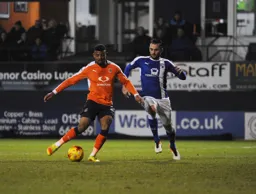 Isaac Vassell completes the scoring with Town`s fourth goal