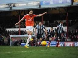 Danny Hylton takes the penalty