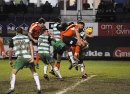 Glen Rea and Johnny Mullins threaten the Yeovil goal