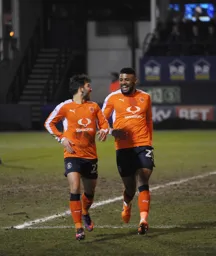 Luke Gambin celebrates scoring Town`s second goal with Isaac Vassell