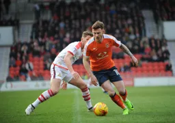 Jordan Cook goes past his marker