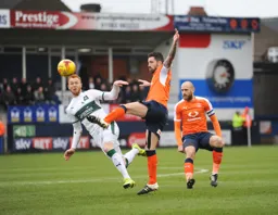 Alan Sheenhan clears the ball