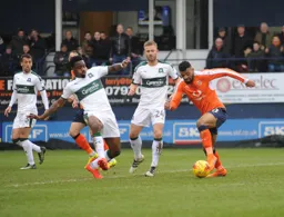 Yann Songo`o moves in to try and block Isaac Vassell