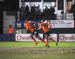 Isaac Vassell wheels away in celebration