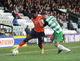 Pelly-Ruddock Mpanzu hugs the touchline to get past Ryan Dickson