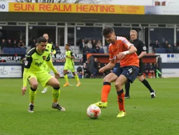 Jonathan Smith controls the ball