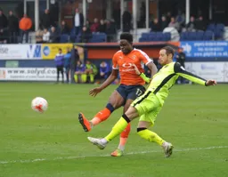 The ball is cleared before Pelly-Ruddock Mpanzu can intervene