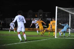 Ollie Palmer sees his header blocked by Joe Day