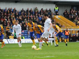 Danny Hylton`s second half penalty rescues a point for the Town
