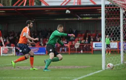 Ollie Palmer follows the ball in as Omar Beckles heads the ball into his own goal