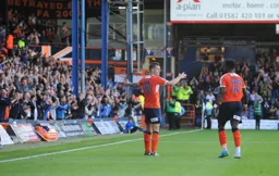 John Collins has just completed his hat-trick with Town`s seventh goal