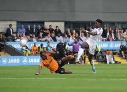 Pelly-Ruddock Mpanzu tries a long range shot