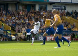 Pelly-Ruddock Mpanzu has a go from long range