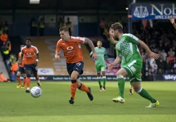 James Collins in a race for the ball with Dion Conroy