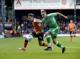 Harry Cornick tries to get around Chris Hussey