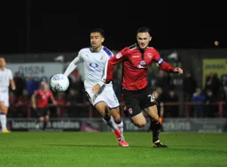 Olly Lee and Michael Rose in hot pursuit of the ball
