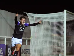 Happy Harry Cornick after scoring Town`s fourth goal
